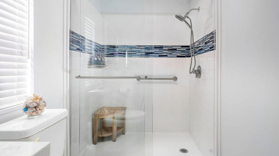BestBath walk-in shower enclosure with customized tile inlay.